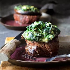 Beef Tenderloin Fillets with Spinach Stuffed Portobello Mushrooms and Red Wine Sauce